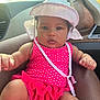 baby, child, infant, swimsuit, hat, polka_dot, pink, car_interior, seat, sunlight, person, foot, relaxing, summer, cute, portrait, window, skin, hand, closeup