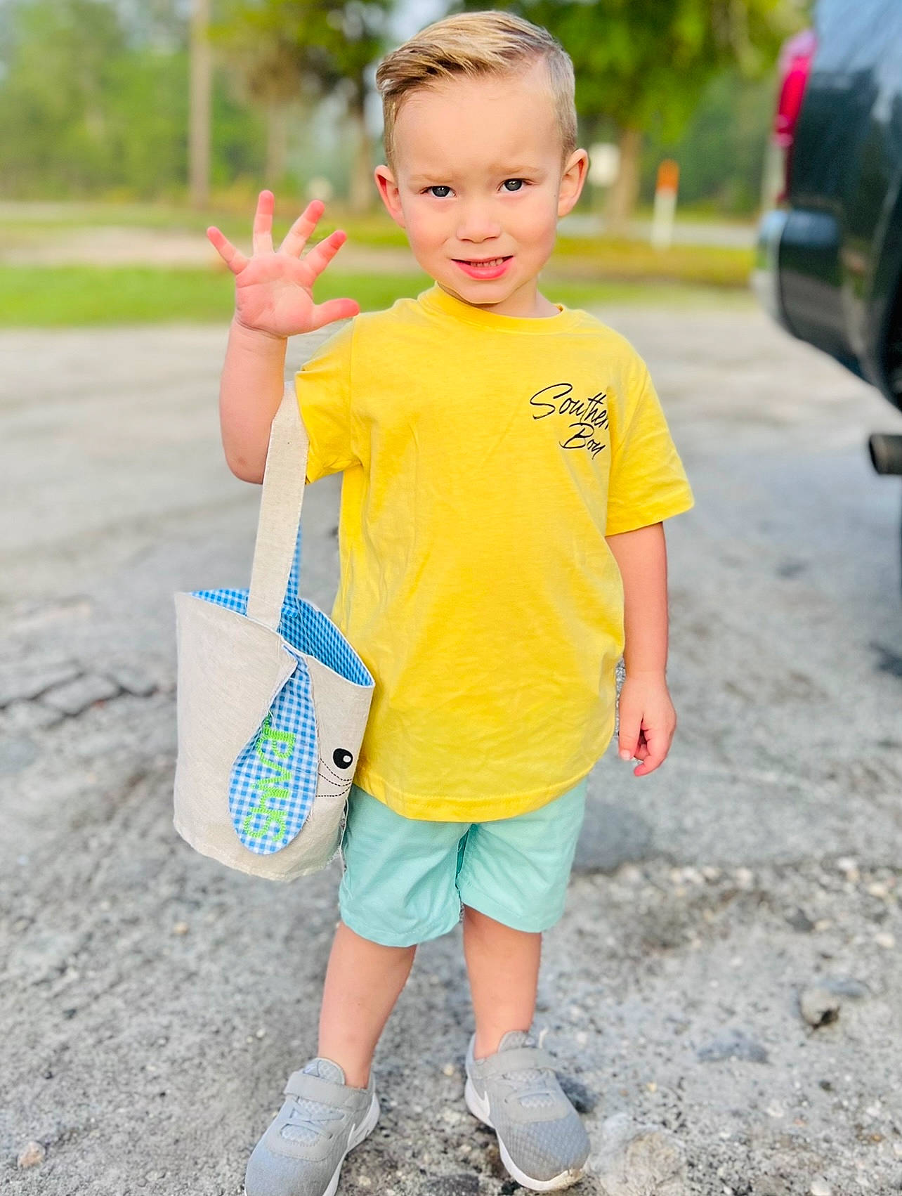 Shivar is registered to the contest to win money with this photo: asphalt, child, face, footwear, grass, hairstyle, happy, joint, leisure, person, pink, plant, recreation, shoe, shorts, sleeve, sneakers, street_fashion, style, summer