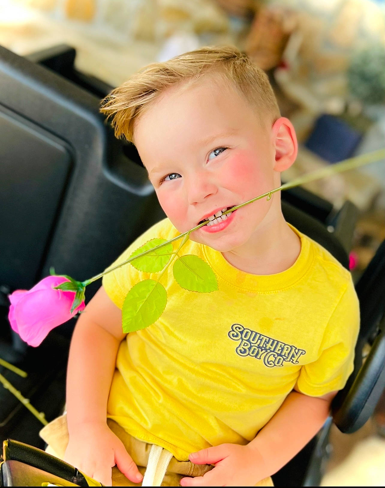 Shivar is registered to the contest to win money with this photo: baby_products, baby_toddler_clothing, chair, child, fashion, fun, grass, happy, leisure, person, product, recreation, sitting, skin, smile, summer, t_shirt, tire, toddler, wheel