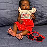 Emori joined the competition — help win amazing prizes! baby, child, infant, couch, blue, quilted, clothing, red_shorts, white_top, stars, sunglasses, star_shaped, foot, hand, face, eyes, indoor, portrait, cute, seated