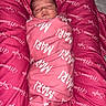 baby, bed, blanket, child, cozy, cushion, cute, indoors, infant, newborn, pacifier, patterned_bedding, peaceful, pink, portrait, resting, sleeping, soft, swaddled, wrapped