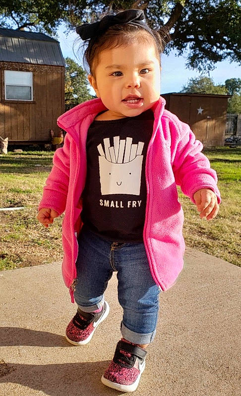 Owynn is registered to the contest to win money with this photo: boy, child, cool, day, fun, girl, jacket, jeans, outerwear, person, pink, play, product, recreation, red, shoe, sleeve, smile, sweater, textile