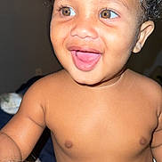 Jaquavion is registered to the contest to win money with this photo: toddler, child, smiling, happy, indoor, face, skin, eyes, mouth, hair, curly_hair, diaper, bare_chest, expression, portrait, person, cute, baby, young, joyful