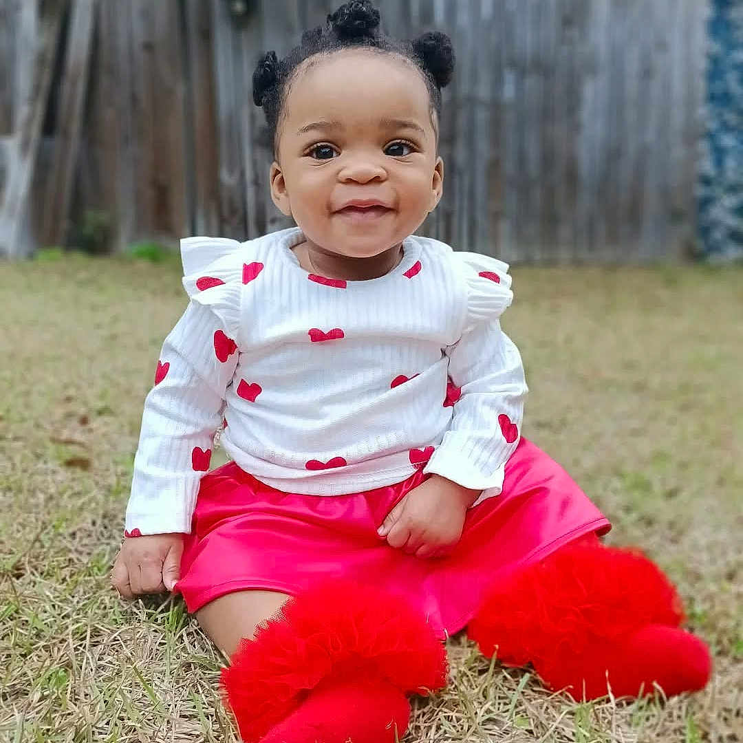 Cayleigh Williams joined the competition — help win amazing prizes! baby, backyard, child, clothing, dress, face, female, girl, grass, happy, head, nature, outdoors, pants, person, photography, plant, portrait, sitting, yard