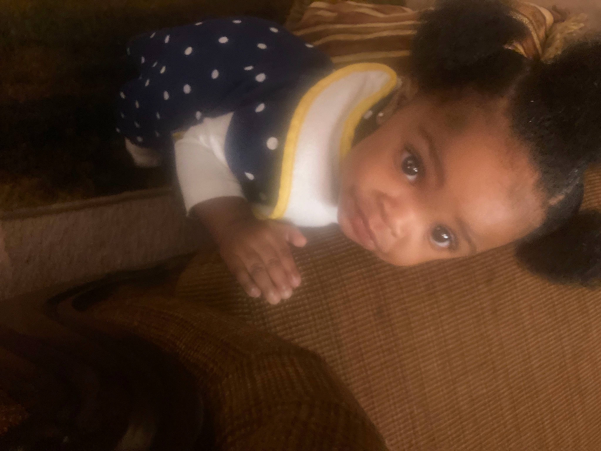 Chloe is registered to the contest to win money with this photo: baby, baby_toddler_clothing, brown_hair, eyebrow, eyelash, hair_accessory, person, polka_dot