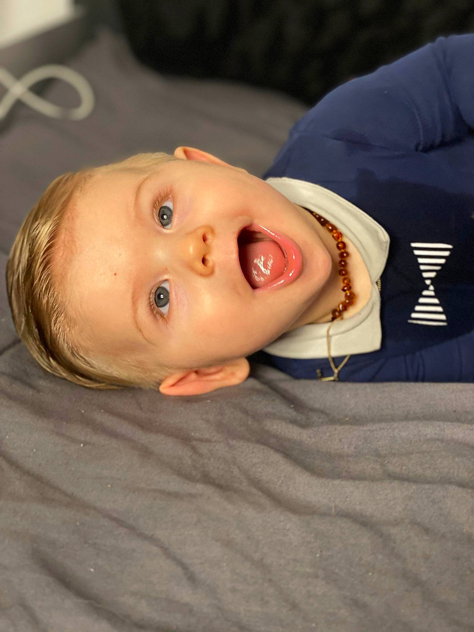 Owen a rejoint le concours — aidez-le/la à gagner de superbes lots ! baby, baby_toddler_clothing, cheek, collar, comfort, eye, eyebrow, eyelash, flash_photography, happy, human_body, iris, lip, mouth, neck, nose, person, sleeve, smile, surprise