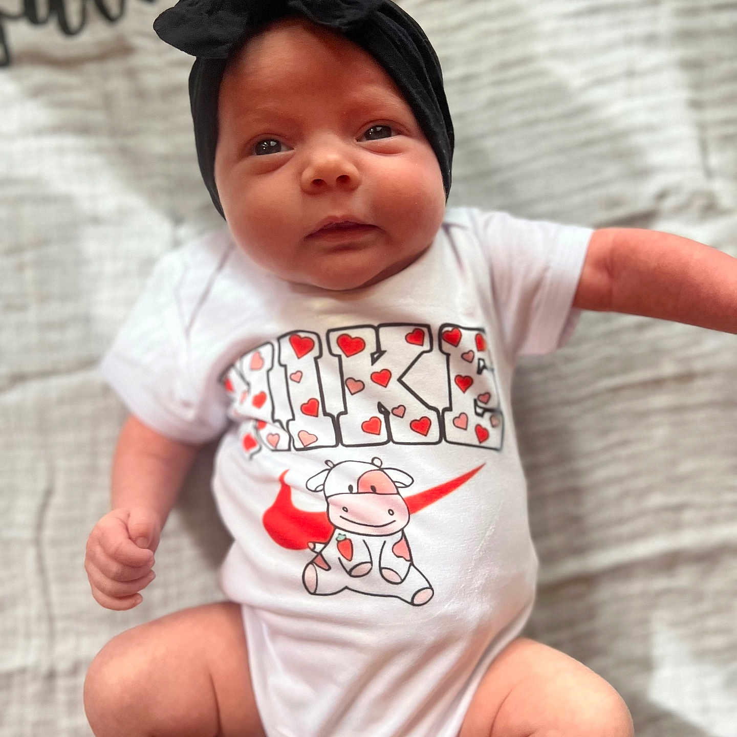 Bryer is registered to the contest to win money with this photo: accessories, applique, baby, baseballcap, bodypart, bonnet, bracelet, cap, clothing, costume, diaper, dress, face, finger, formalwear, frown, glasses, hand, happy, hat