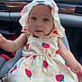 Oaklynn is registered to the contest to win money with this photo: adorable, arm, baby, bonnet, car_interior, child, clothing, cute, dress, eyes, face, gingham, infant, person, portrait, seat, sitting, strawberry_pattern, yellow, young