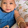 Oaklynn is registered to the contest to win money with this photo: apparel, baby, bow, bracelet, child, cute, denim, face, floral, headband, infant, jewelry, outdoor, person, pillow, portrait, reaching_hand, skin, smiling, young_child