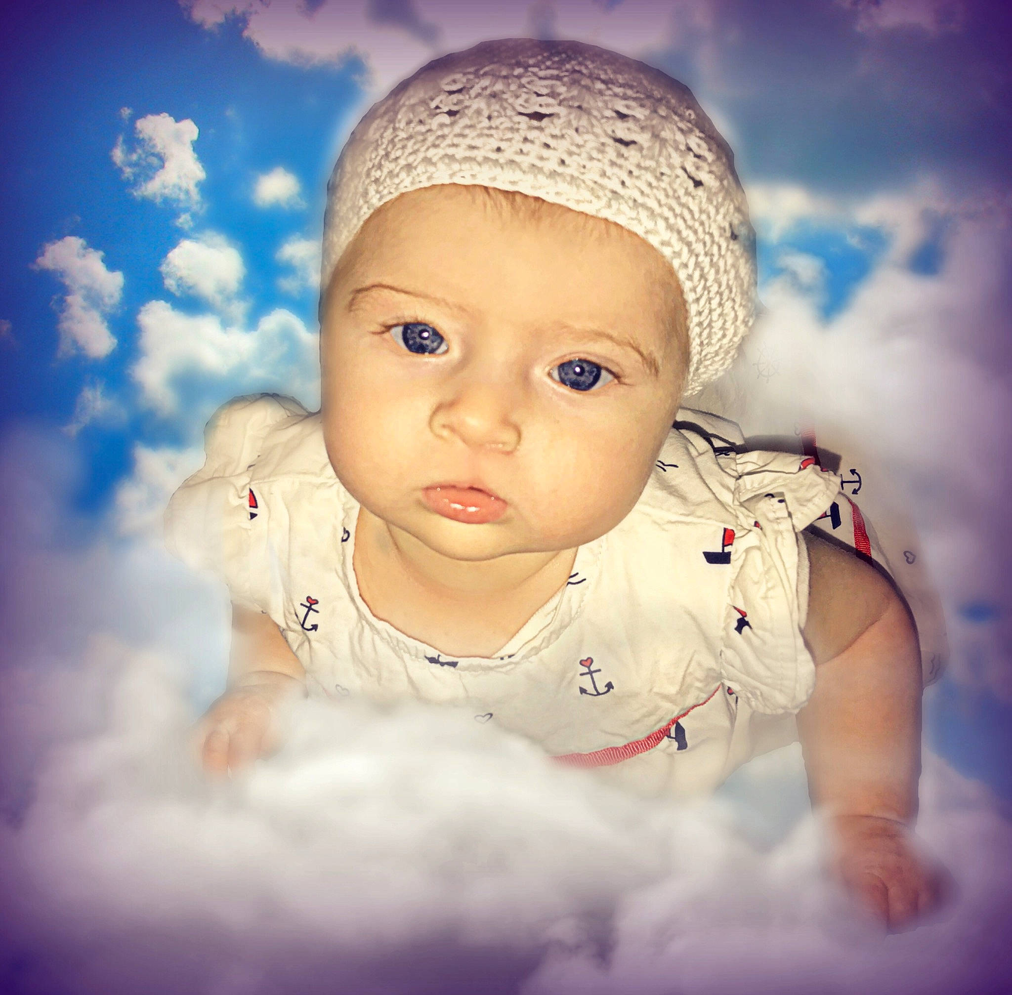 Ashleigh is registered to the contest to win money with this photo: baby, cheek, child, cloud, cool, eye, face, forehead, head, headgear, human, lip, meteorological_phenomenon, nose, person, photography, portrait, skin, sky, smile