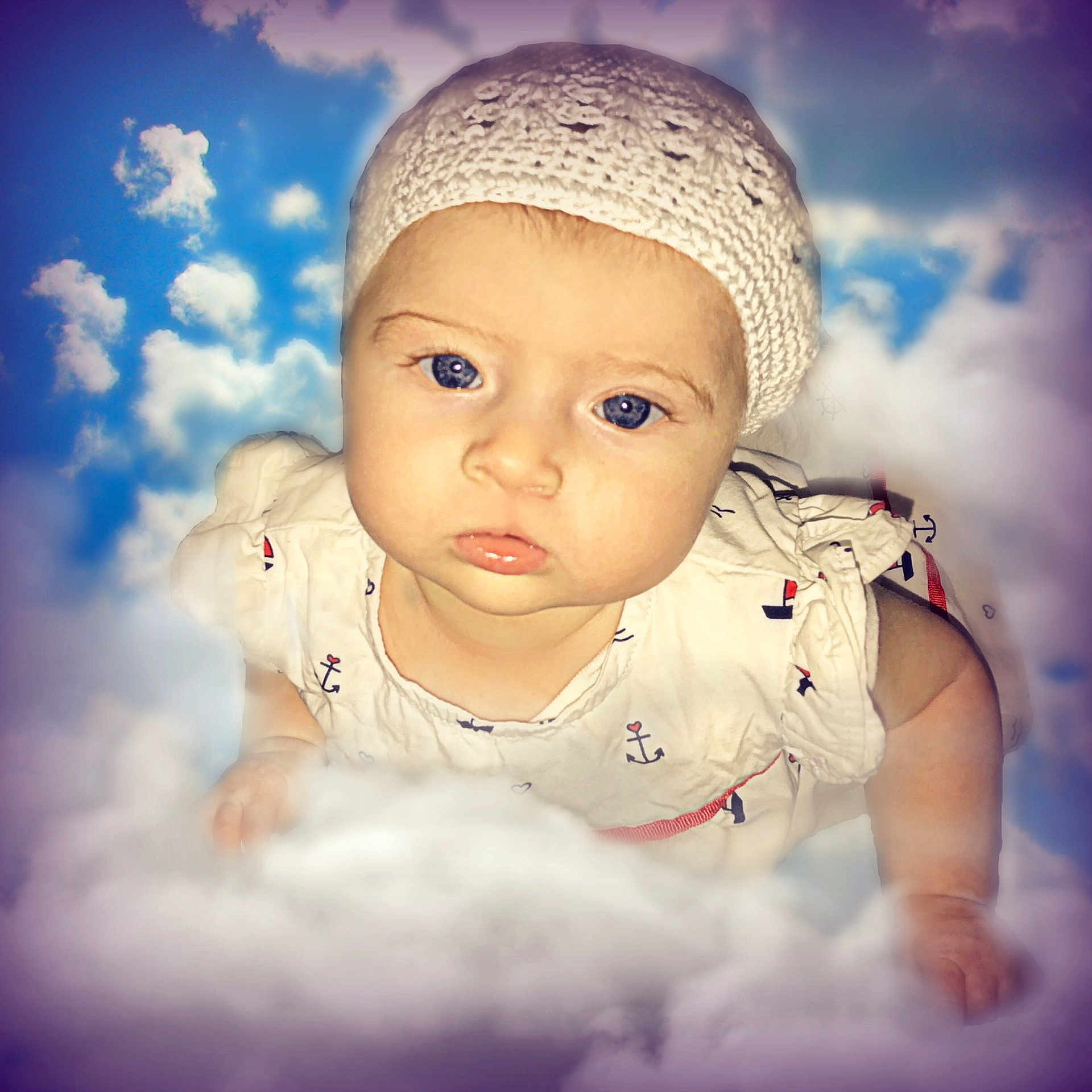Ashleigh is registered to the contest to win money with this photo: baby, cheek, child, cloud, cool, eye, face, forehead, head, headgear, human, lip, meteorological_phenomenon, nose, person, photography, portrait, skin, sky, smile