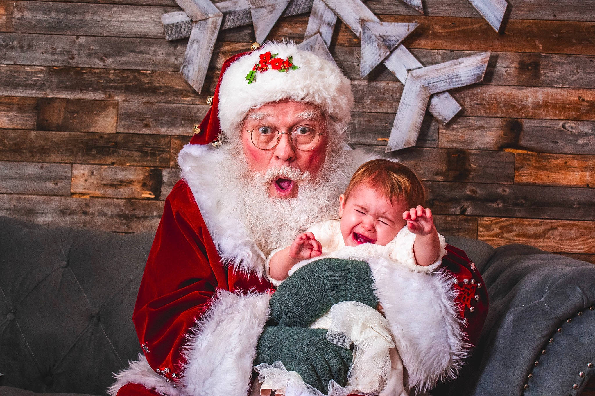 Alexis is registered to the contest to win money with this photo: beard, christmas, christmas_eve, comfort, costume_hat, event, facial_hair, fictional_character, fun, fur, happy, hat, headwear, holiday, lap, moustache, person, red, santa_claus, smile