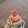 baby, child, infant, smiling, sitting, activity_seat, baby_walker, carpet, indoor, living_room, office_chair, charging_cable, toy, rainbow, winnie_the_pooh, clothing, portrait, happy, home, photograph