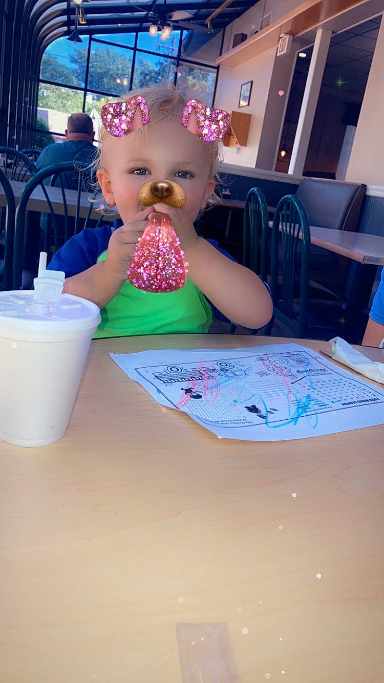 Jaxson joined the competition — help win amazing prizes! baby, baby_toddler_clothing, blue, chair, child, desk, drinkware, flooring, fun, furniture, headwear, houseplant, indoor_games_and_sports, leisure, person, play, recreation, sitting, sweetness, table