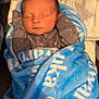 Luka joined the competition — help win amazing prizes! baby, bed, blanket, blue_blanket, clothing, cozy, cute, face, head, indoors, infant, newborn, peaceful, portrait, resting, sleeping, soft, warm_lighting, wrapped, young_child