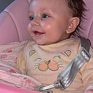 Zalyah participe au concours pour gagner de l'argent avec cette photo : baby, infant, child, smile, face, high_chair, pink, clothing, seatbelt, cute, happy, indoor, person, closeup, portrait, comfort, sitting, soft_toys, fabric, cozy