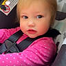 baby, blonde_hair, blue_eyes, car_seat, child, close_up, cute, expression, face, heart_overlay, indoors, infant, pink_clothing, polka_dot, portrait, safety, seatbelt, soft_lighting, toddler, young_child