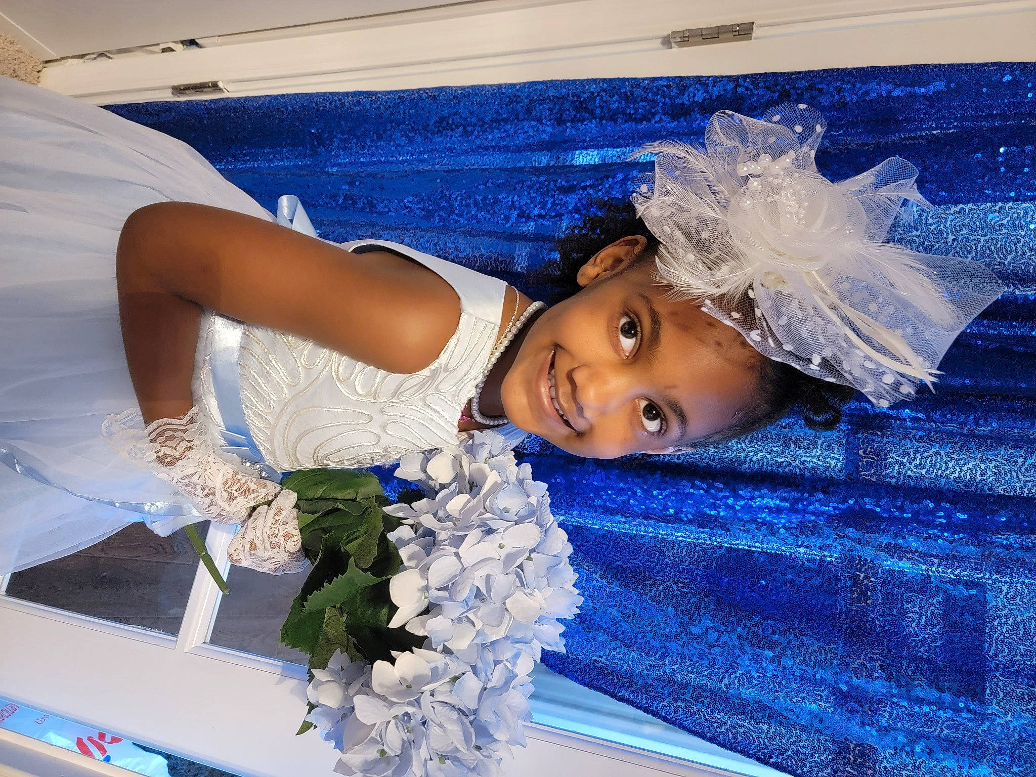 Kamille joined the competition — help win amazing prizes! azure, blue, bridal_accessory, cut_flowers, electric_blue, event, fashion_accessory, floral_design, flower, flower_arranging, formal_wear, fun, happy, headpiece, headwear, joy, person, petal, plant, smile