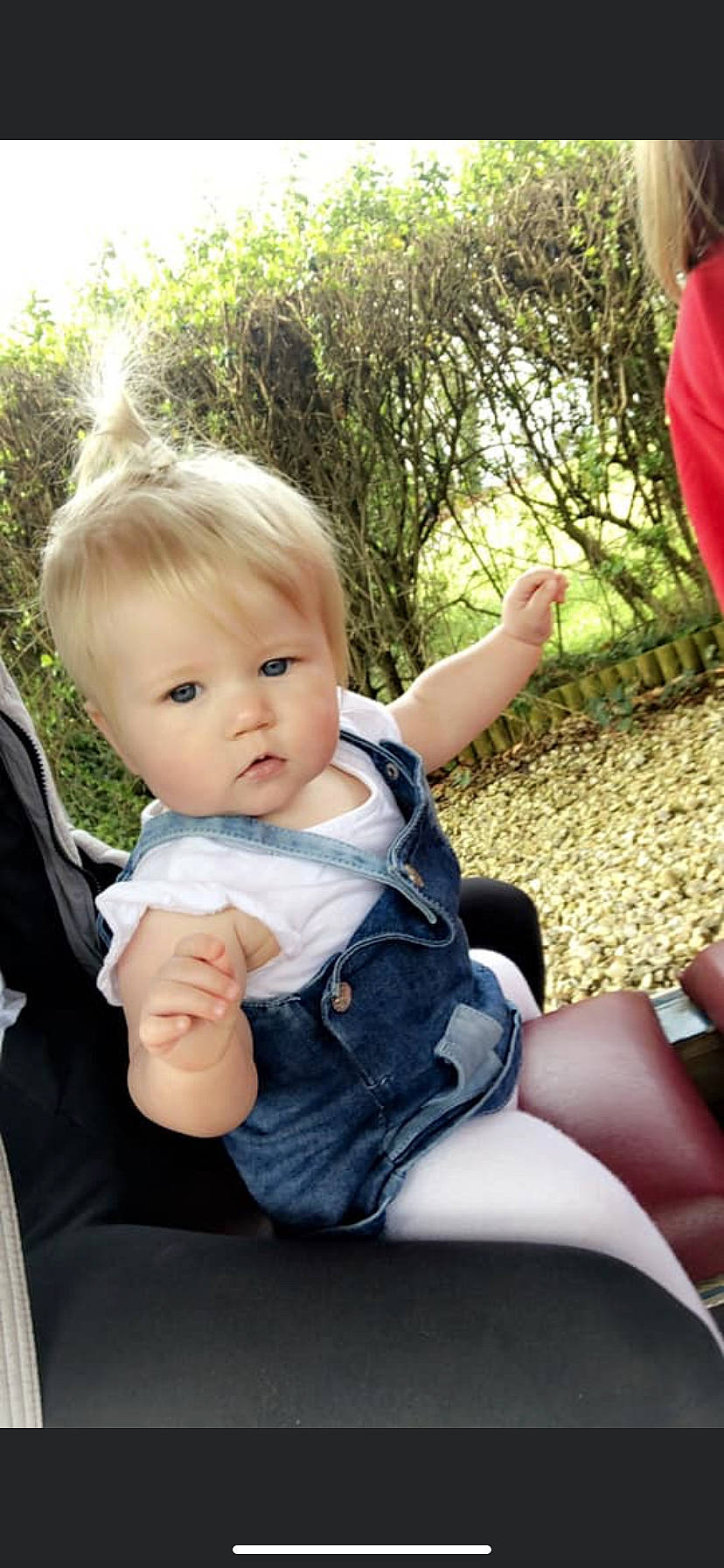 Kali joined the competition — help win amazing prizes! baby, baby_products, child, finger, gesture, grass, leisure, person, product, sitting, smile, toddler, tree