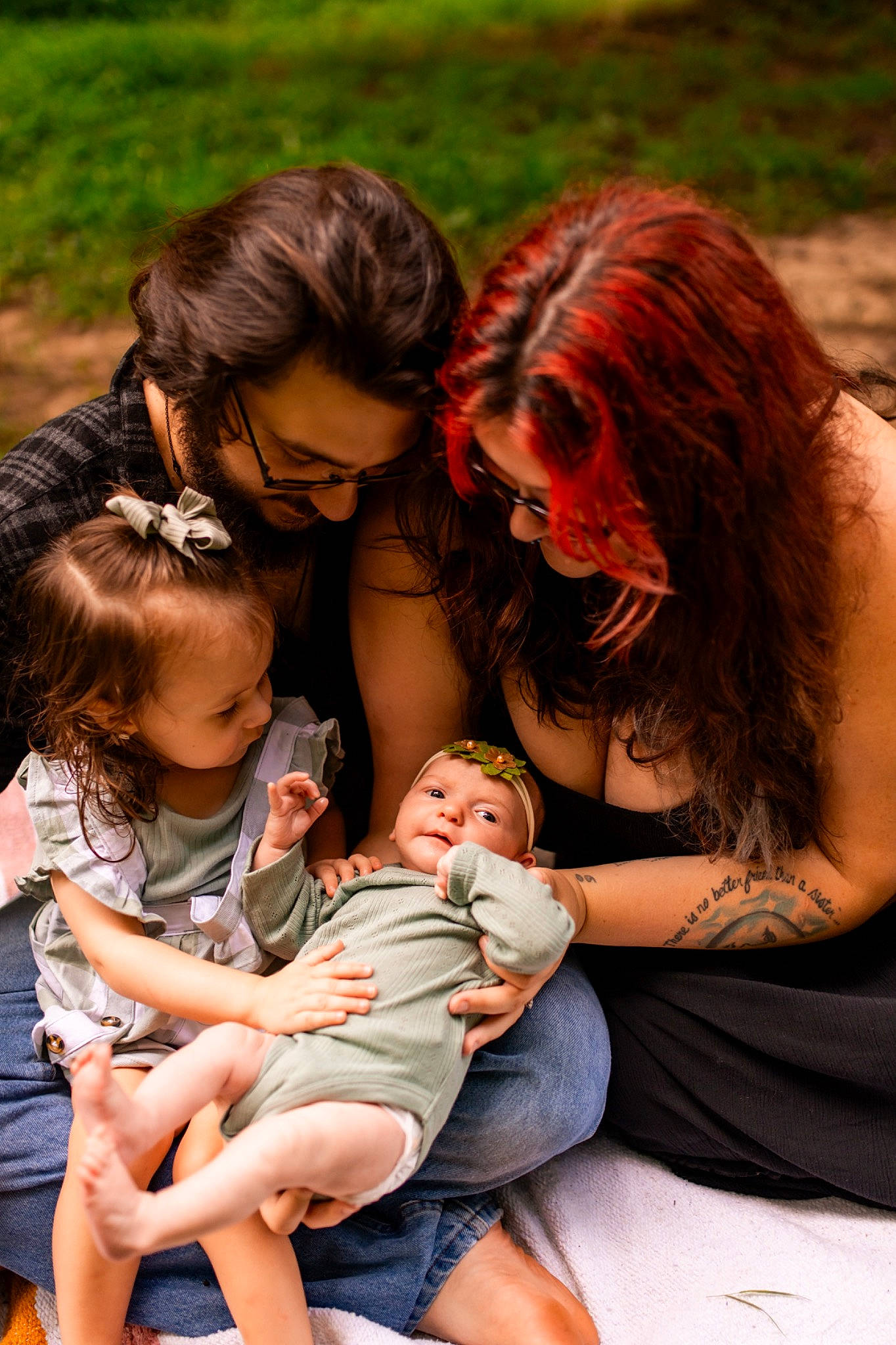 Emberlina joined the competition — help win amazing prizes! baby, beauty, child, event, fun, grass, happy, human, interaction, leisure, mammal, people, people_in_nature, person, recreation, sitting, skin, summer, thigh, toddler