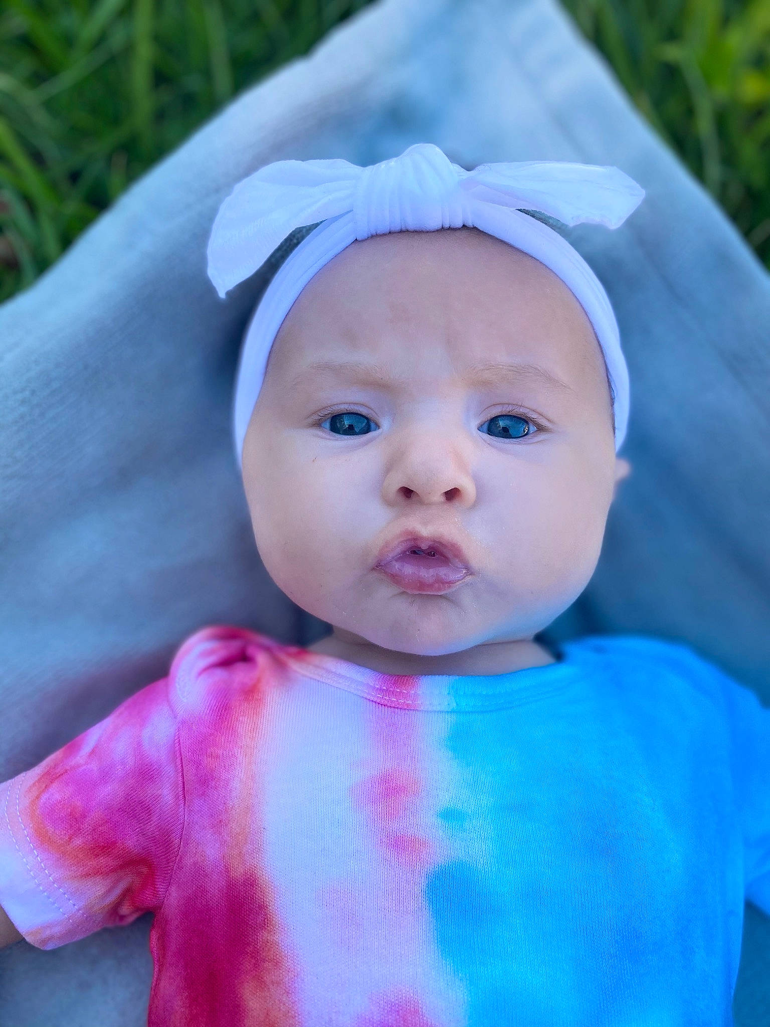 Emberlina is registered to the contest to win money with this photo: baby, baby_toddler_clothing, cap, cheek, chin, electric_blue, eye, eyebrow, face, facial_expression, happy, head, headgear, headwear, iris, lip, nose, person, pink, skin