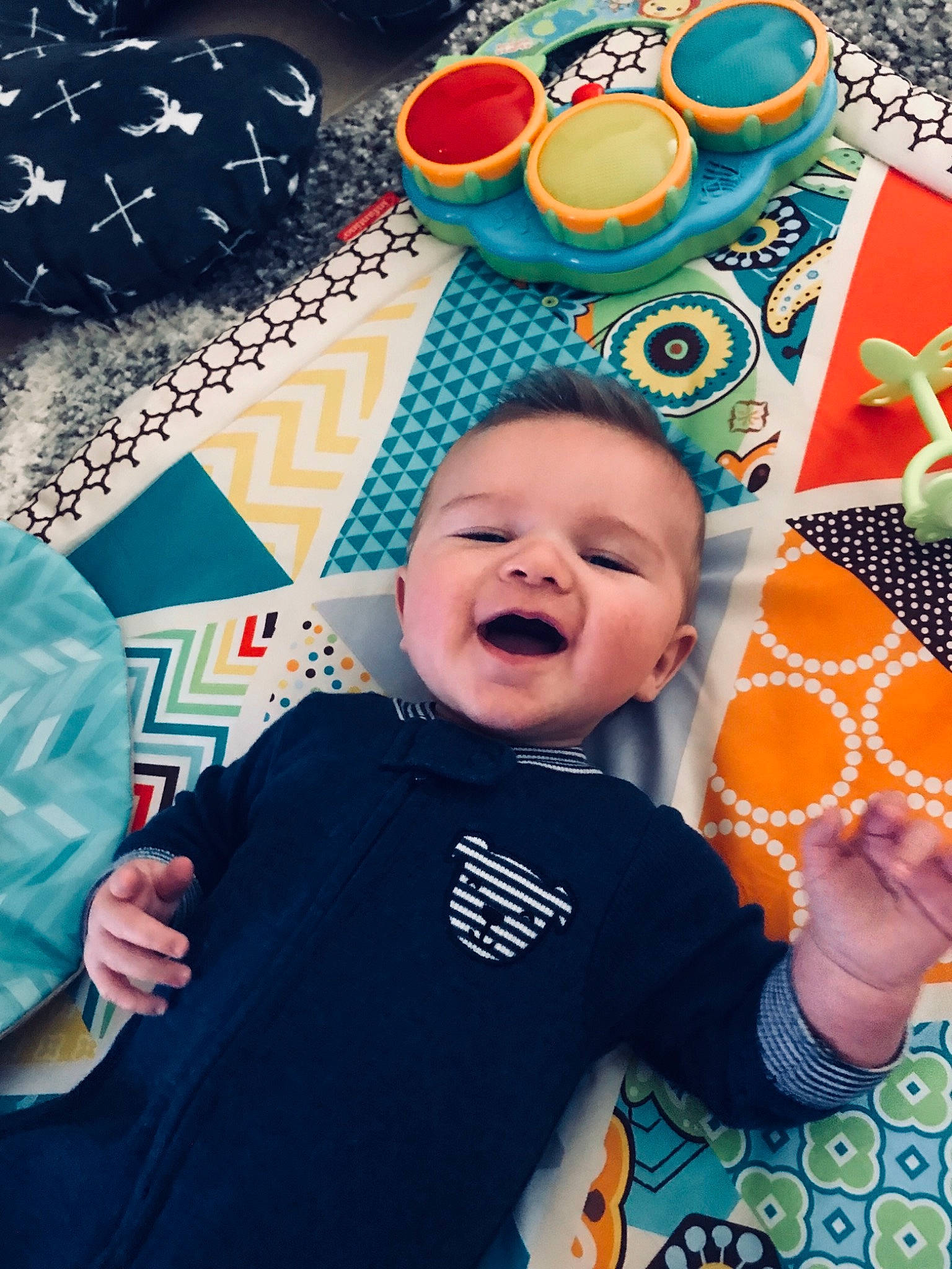 Jayse is registered to the contest to win money with this photo: child, cool, design, fun, happiness, infant, leisure, material, pattern, person, play, product, smile, textile, toddler