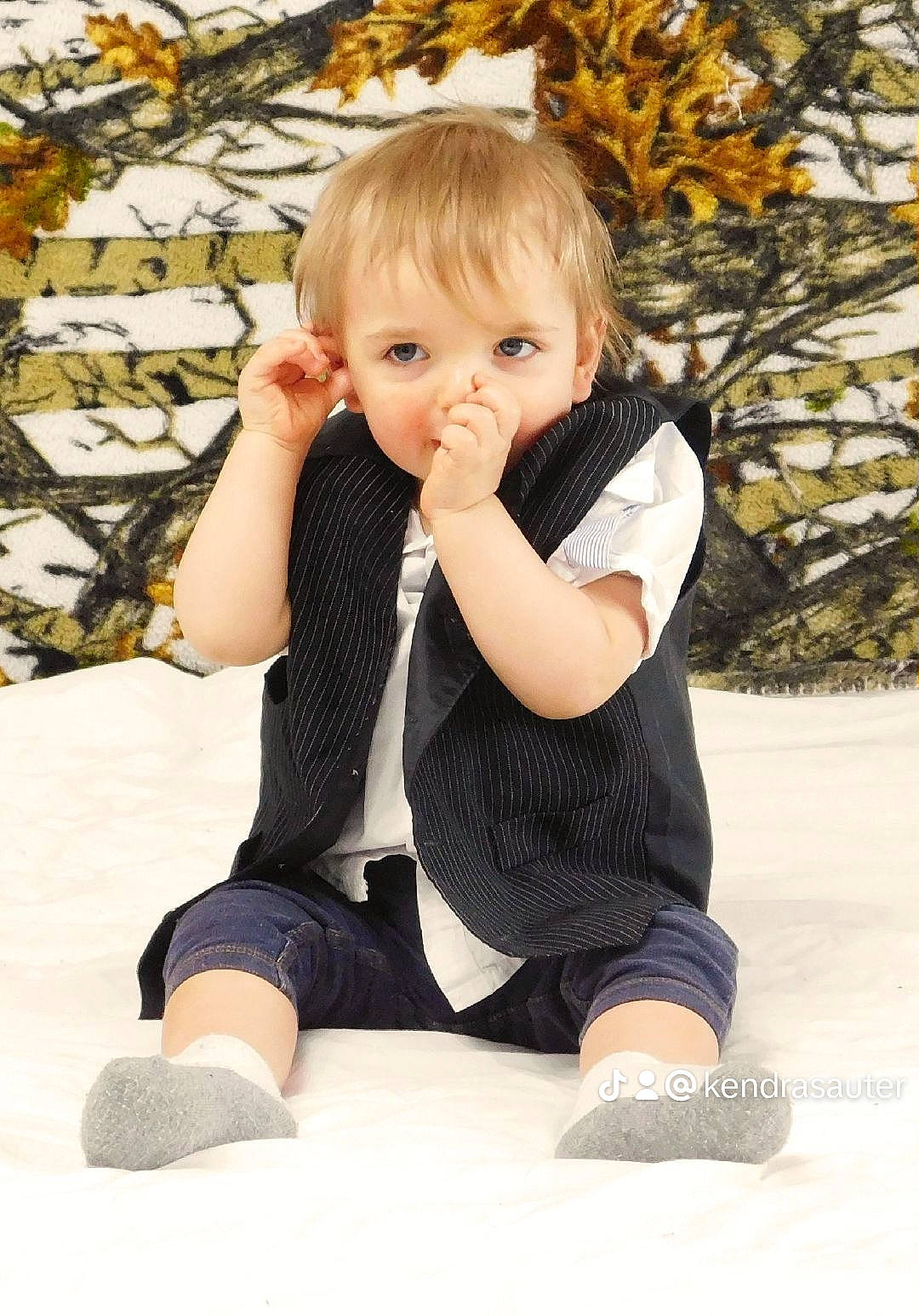 Caden is registered to the contest to win money with this photo: baby_toddler_clothing, barefoot, blond, child, finger, foot, happy, human_leg, joint, knee, pattern, people_in_nature, person, sleeve, sock, sportswear, standing, t_shirt, thigh, toddler