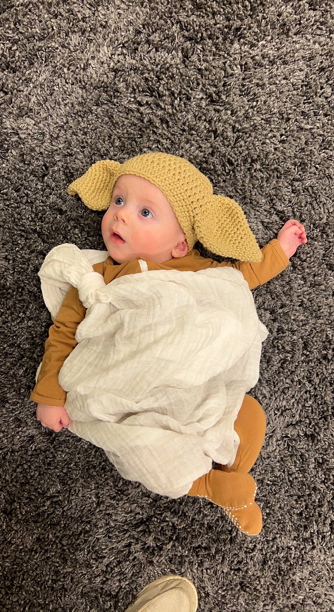Jordy joined the competition — help win amazing prizes! baby, baby_toddler_clothing, cap, child, doll, fashion_accessory, grass, hat, headgear, headwear, leaf, linens, pattern, people_in_nature, person, pink, sitting, skin, sun_hat, surprise