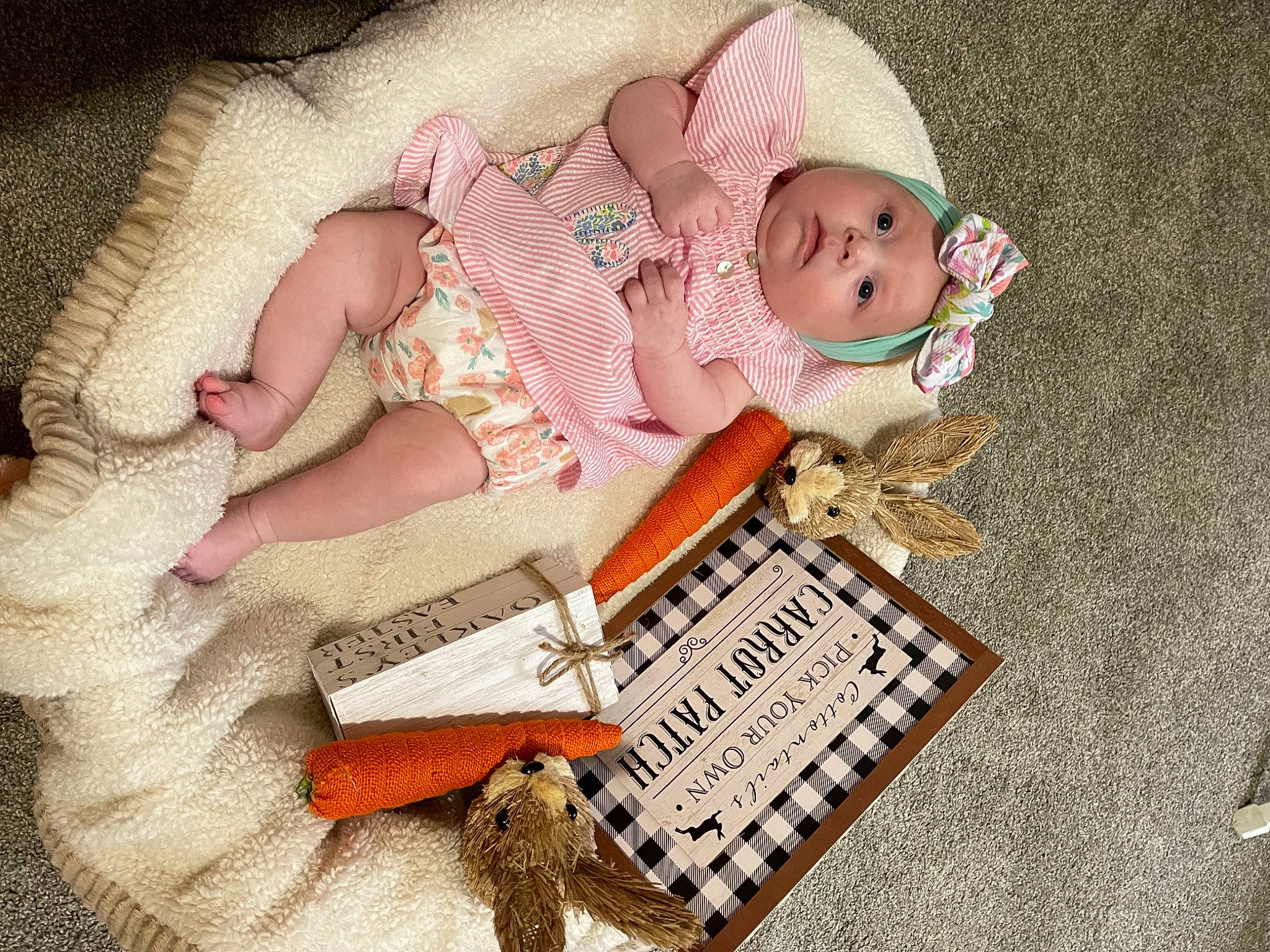 Oakley June is registered to the contest to win money with this photo: art, baby, baby_products, baby_sleeping, baby_toddler_clothing, cheek, child, comfort, font, headwear, illustration, linens, office_equipment, office_supplies, pattern, peach, person, pink, product, textile