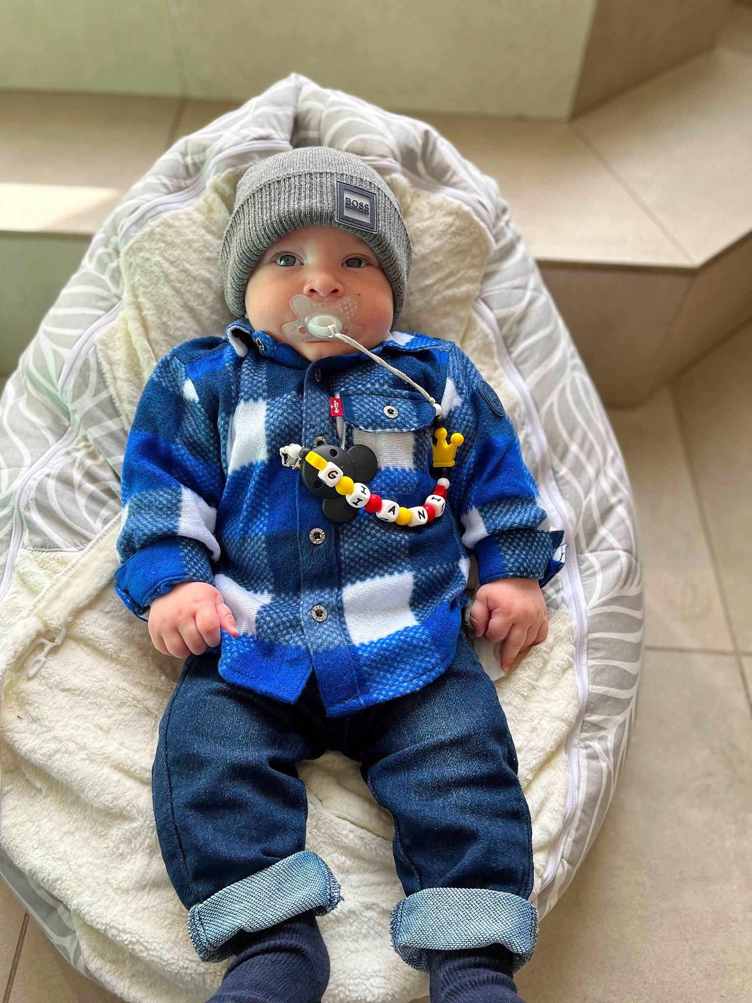 Giani participe au concours pour gagner de l'argent avec cette photo : baby, baby_in_car_seat, baby_products, baby_sleeping, baby_toddler_clothing, bag, car_seat, chair, child, collar, comfort, electric_blue, fun, headwear, linens, outerwear, person, personal_protective_equipment, purple, sitting