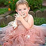 toddler, child, cake_smash, pink_tutu, frosting, messy, outdoor, garden, flowers, grass, quilt, cute, baby, happy, playful, celebration, portrait, summer, fun, sitting