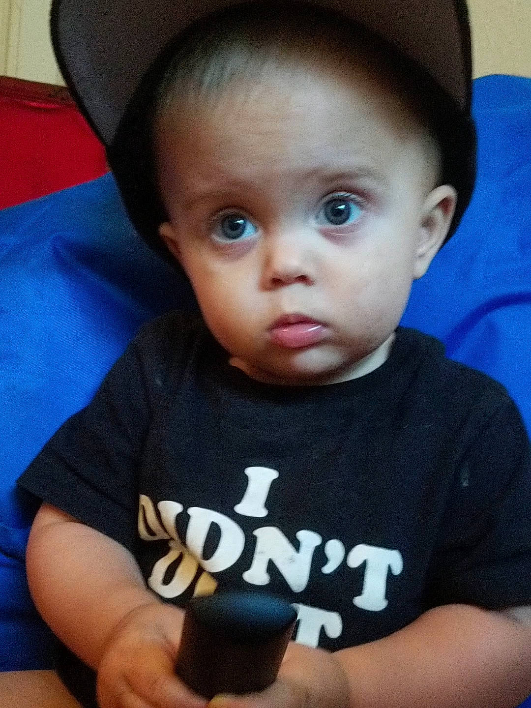 Liam is registered to the contest to win money with this photo: baby, black_hair, cheek, child, chin, cool, ear, eye, eyebrow, face, forehead, fun, head, headgear, lip, male, nose, person, skin, surprise