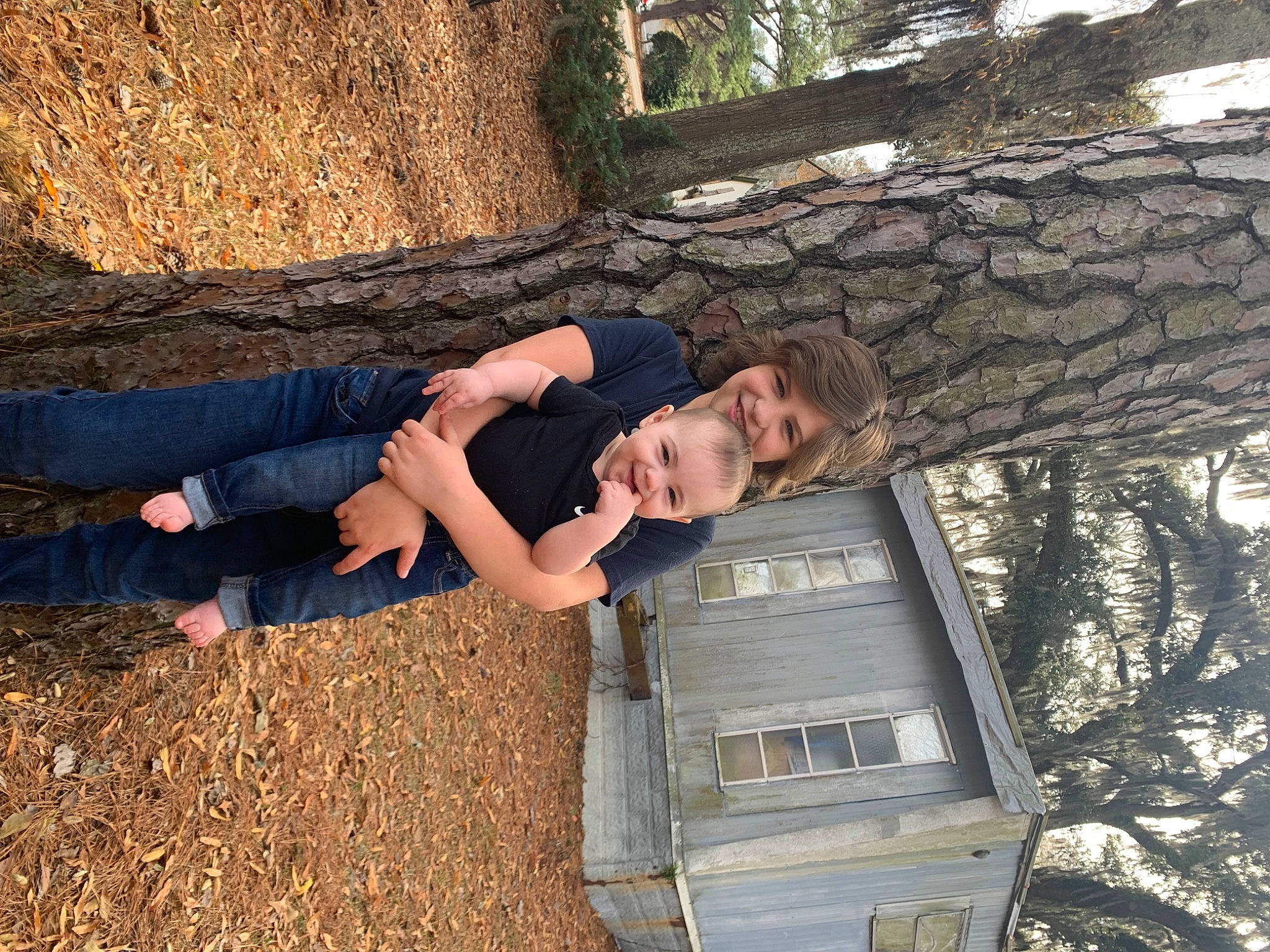 Brandon is registered to the contest to win money with this photo: automotive_exterior, bumper, flash_photography, forest, fun, grass, human_leg, joy, landscape, leisure, motor_vehicle, nature, people_in_nature, person, plant, recreation, soil, tints_and_shades, tree, trunk