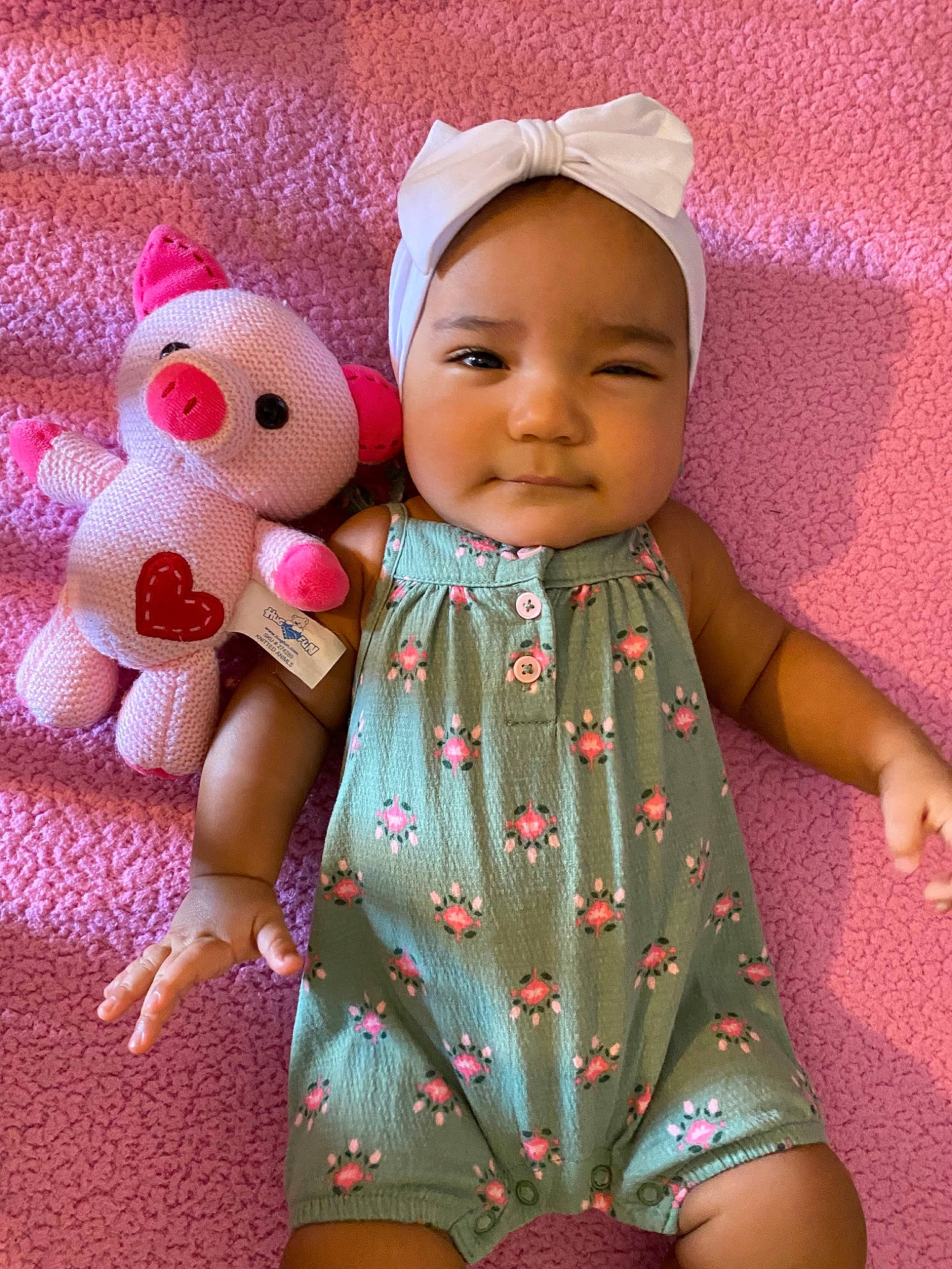Isabella joined the competition — help win amazing prizes! arm, baby, baby_toddler_clothing, cap, cheek, child, dress, facial_expression, finger, hand, magenta, one_piece_garment, person, pink, product, skin, sleeve, textile, thigh, thumb