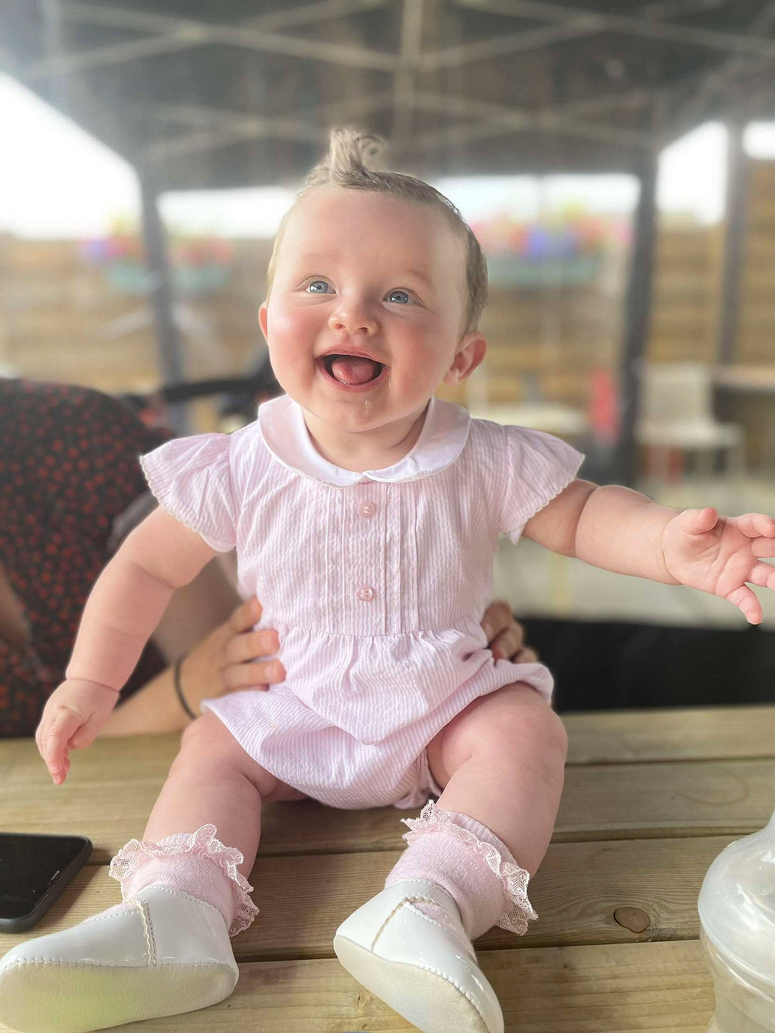 Maisy is registered to the contest to win money with this photo: baby, baby_toddler_clothing, beauty, cheek, child, face, fun, happy, head, human_leg, joy, knee, person, pink, purple, sitting, skin, sleeve, smile, sock