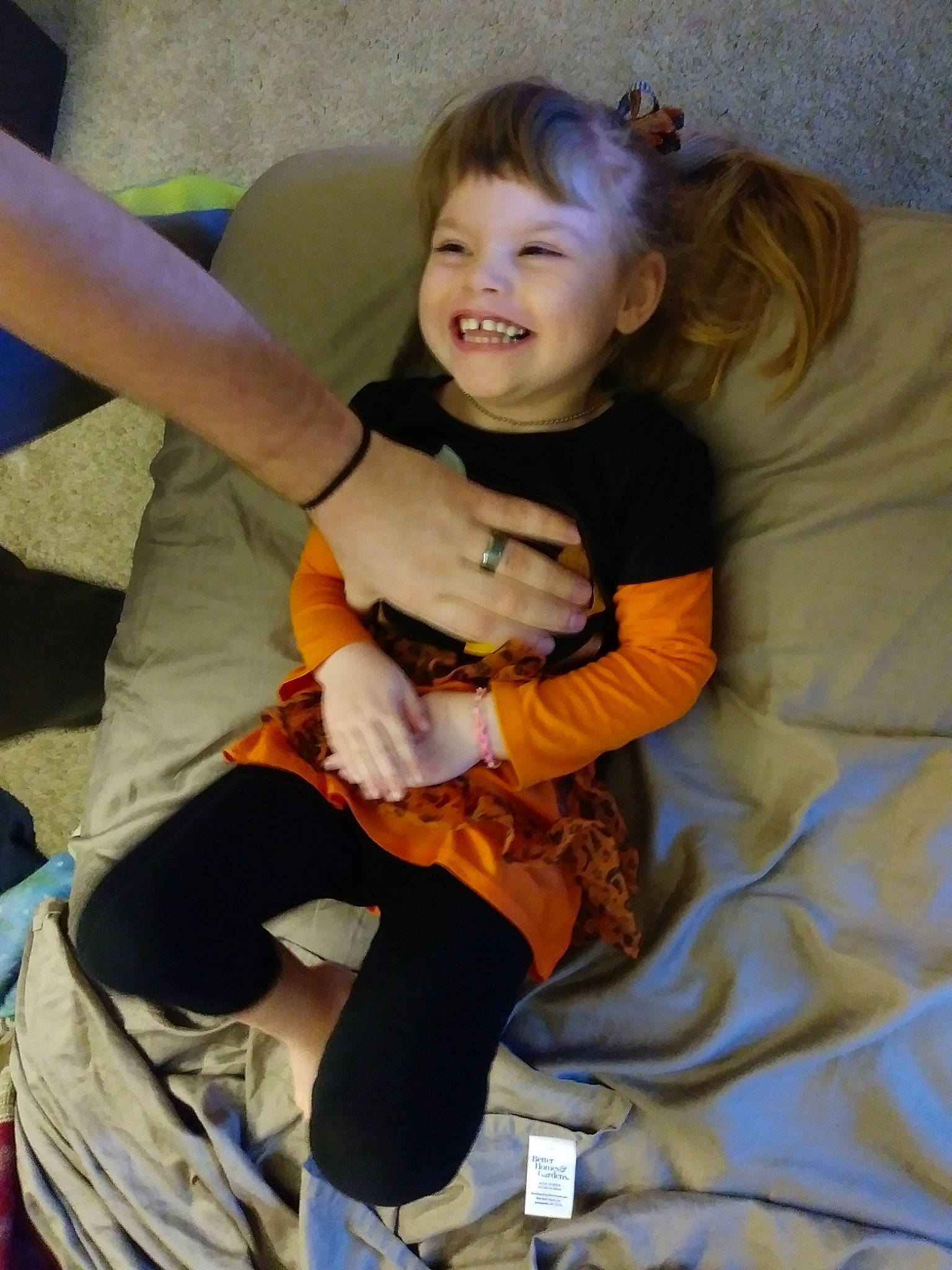 Temperance is registered to the contest to win money with this photo: arm, child, day, finger, fun, girl, hair, infant, joy, leg, person, play, product, sitting, skin, smile, toddler, vertebrate