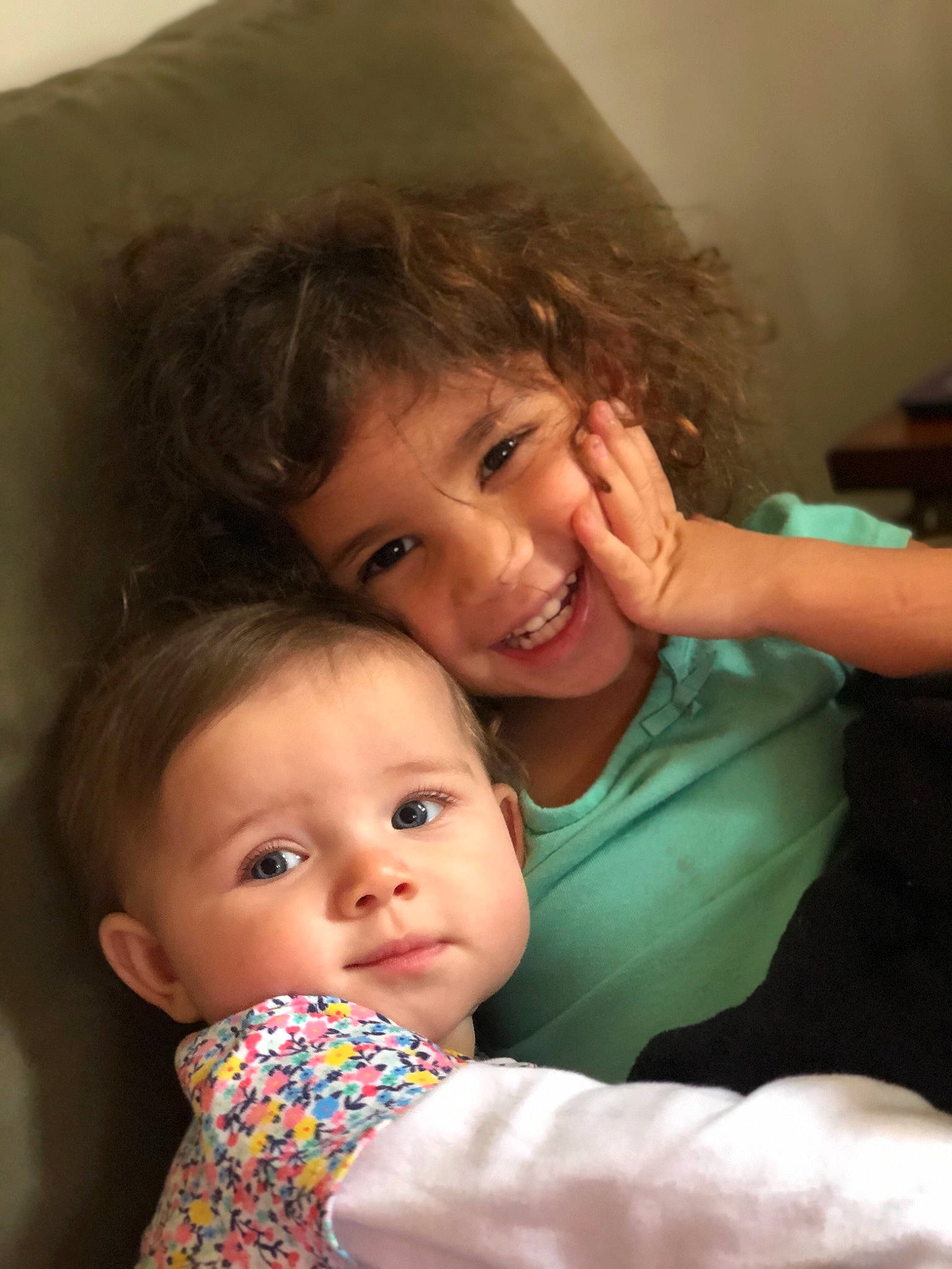 Ava is registered to the contest to win money with this photo: baby, cheek, chin, comfort, eye, face, facial_expression, finger, gesture, hairstyle, happy, head, human_body, iris, joy, lip, mouth, nose, organ, person