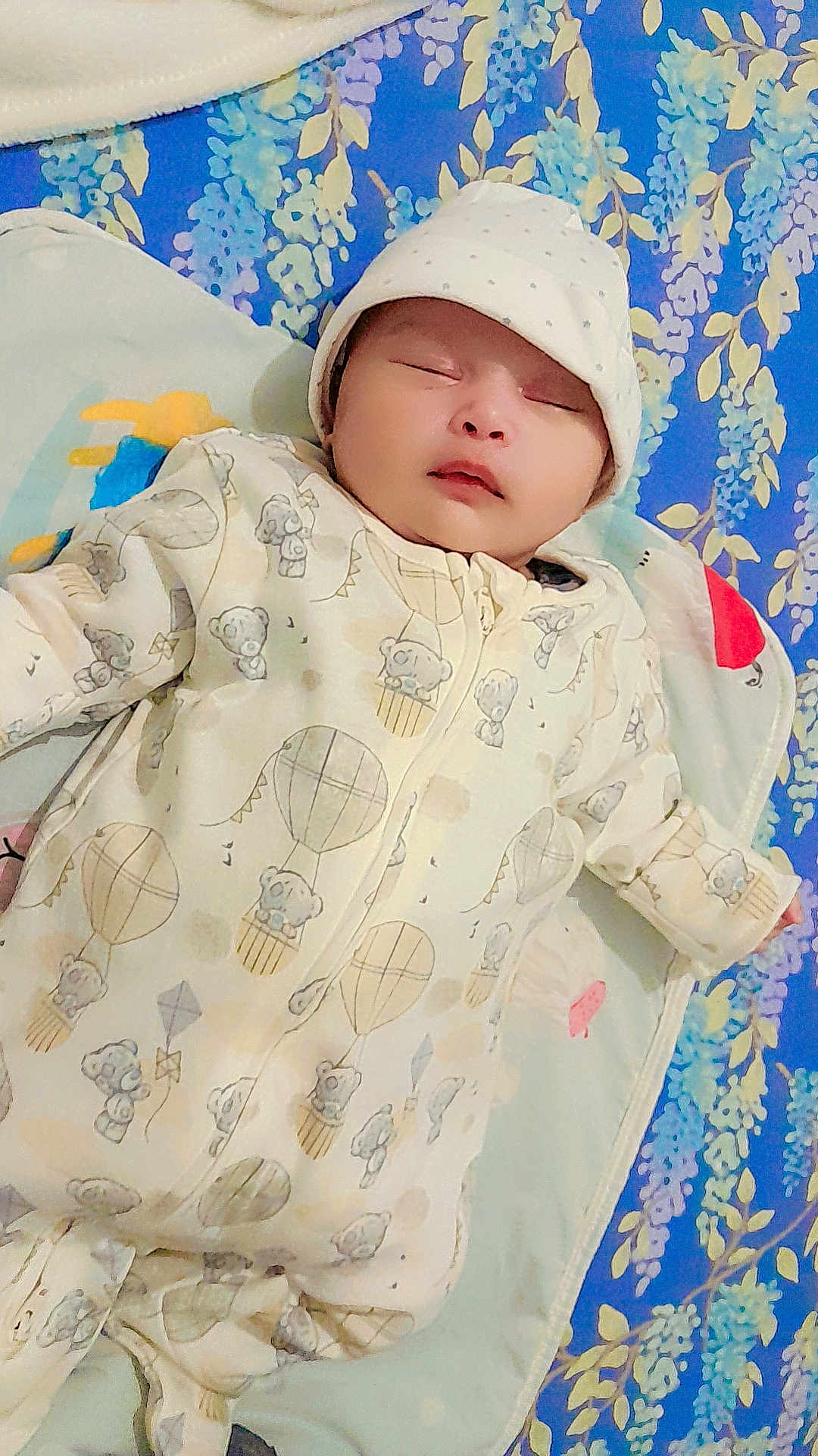 Ayzel joined the competition — help win amazing prizes! baby, sleeping, onesie, hat, blanket, floral_pattern, teddy_bear, hot_air_balloon, infant, cute, cozy, child, bedtime, resting, soft_fabric, indoors, portrait, newborn, peaceful, baby_clothing