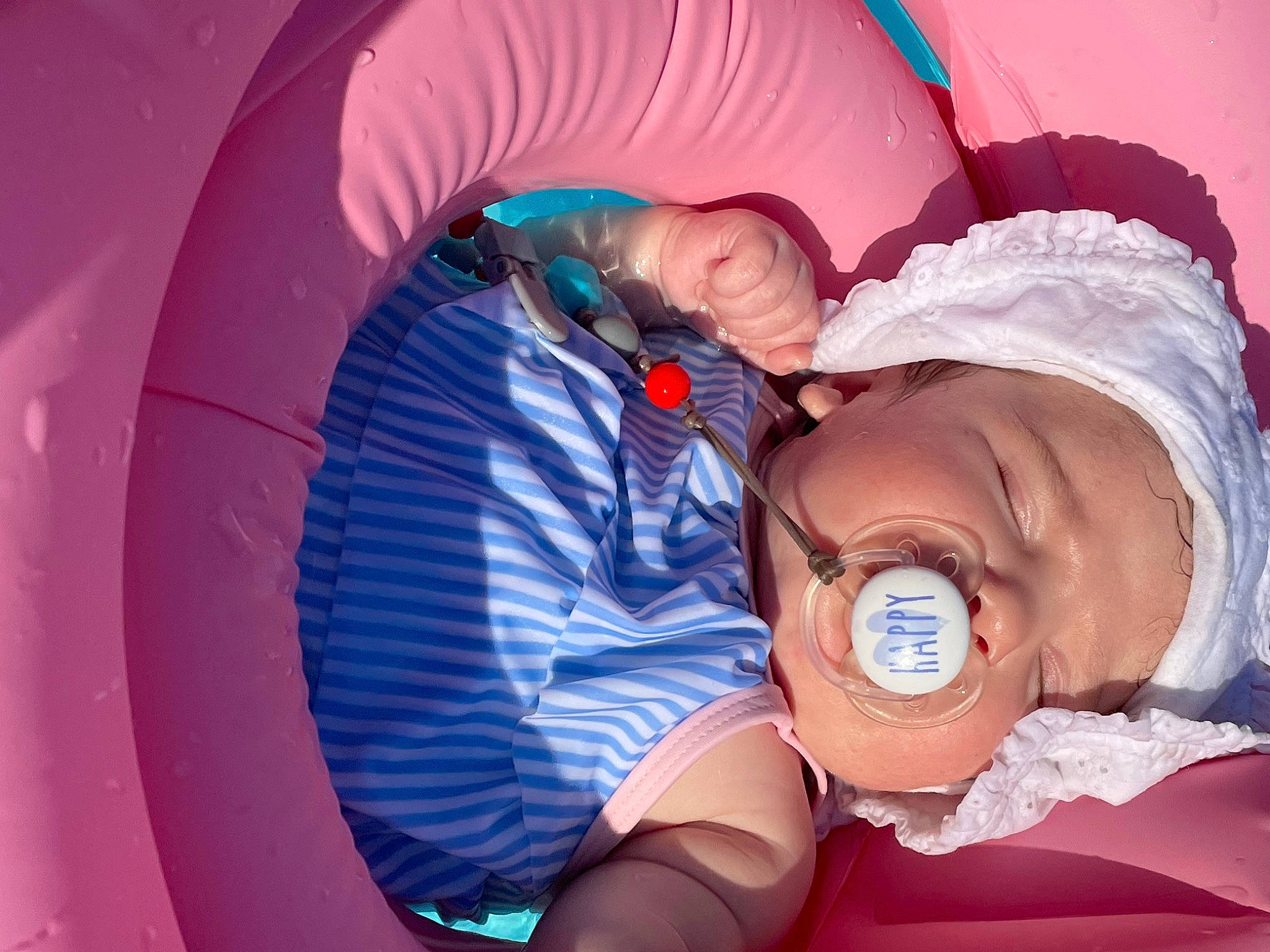 Madison is registered to the contest to win money with this photo: baby, baby_products, child, circle, comfort, electric_blue, event, fun, happy, leisure, magenta, mouth, person, pink, purple, recreation, sitting, skin, toddler, vacation