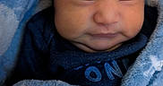 Nathan is registered to the contest to win money with this photo: baby, blanket, blue, child, closeup, clothing, cozy, cute, face, hat, indoors, infant, newborn, peaceful, portrait, resting, sleeping, soft, warm, wrapped