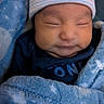 newborn, baby, blanket, blue, hat, sleeping, face, infant, cozy, cute, child, soft, warm, portrait, closeup, clothing, wrapped, peaceful, resting, indoors