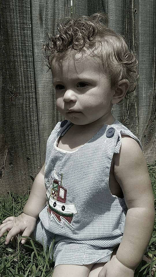 Sawyer is registered to the contest to win money with this photo: child, doll, girl, grass, human_behavior, person, toddler, tree