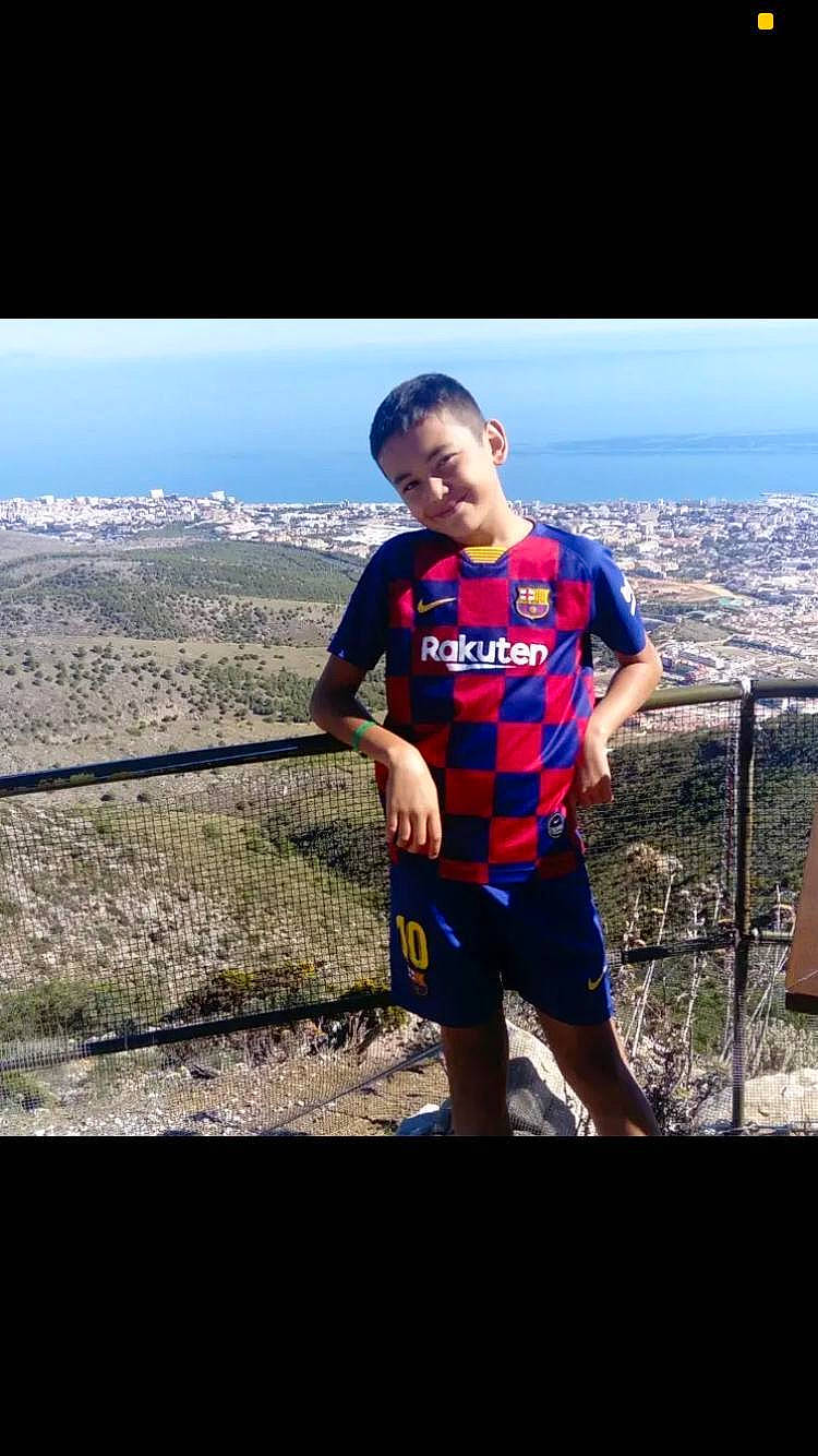 James Gilbertson is registered to the contest to win money with this photo: cool, electric_blue, fence, fun, happy, hill, horizon, joy, landscape, leisure, mountain, mountainous_landforms, outdoor_recreation, people_in_nature, person, recreation, shorts, sky, smile, sportswear