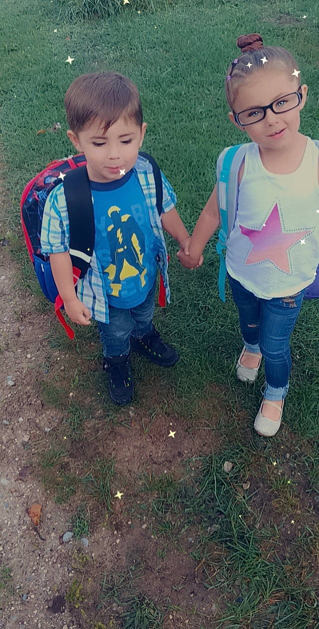 Taylah is registered to the contest to win money with this photo: child, cool, electric_blue, eye, face, fun, grass, hair, hairstyle, happy, head, leaf, leisure, outerwear, people_in_nature, person, personal_protective_equipment, recreation, shoe, t_shirt