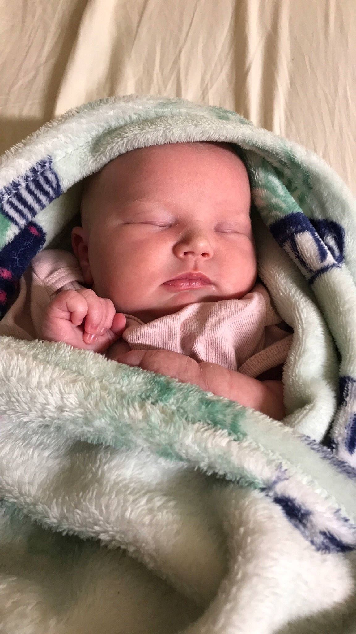 Winter is registered to the contest to win money with this photo: baby, baby_products, baby_sleeping, baby_toddler_clothing, bedtime, cap, cheek, comfort, eye, finger, hand, head, linens, mammal, person, product, skin, textile, toddler, vertebrate