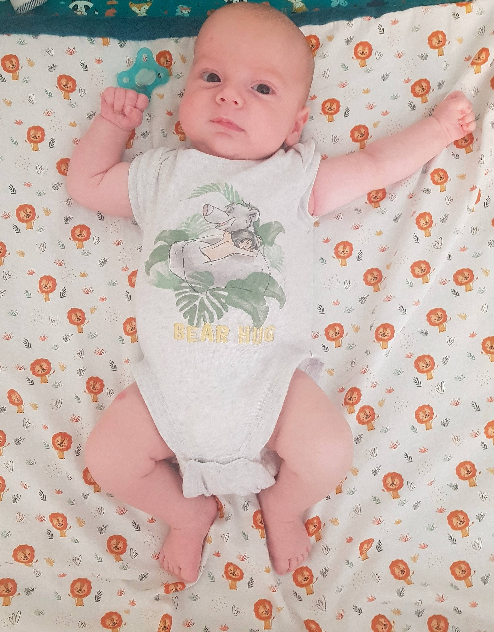 Loann participe au concours pour gagner de l'argent avec cette photo : baby, baby_toddler_clothing, cheek, child, collar, comfort, head, infant_bodysuit, linens, pattern, person, pink, product, red, skin, sleeve, stomach, t_shirt, textile, toddler