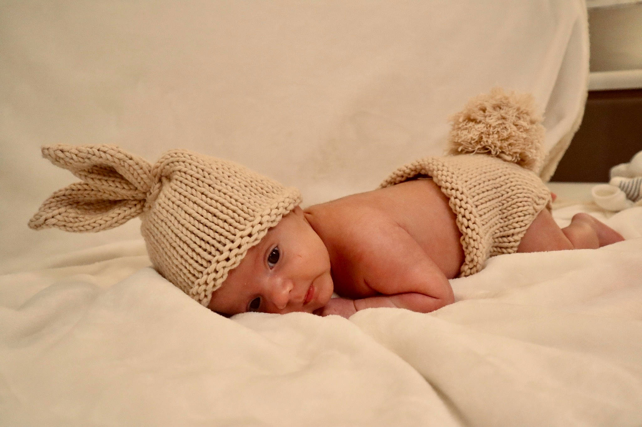 Denver participe au concours pour gagner de l'argent avec cette photo : arm, art, baby, baby_sleeping, baby_toddler_clothing, comfort, eye, finger, hand, happy, headband, headgear, headwear, human_body, human_leg, linens, pattern, person, skin, textile