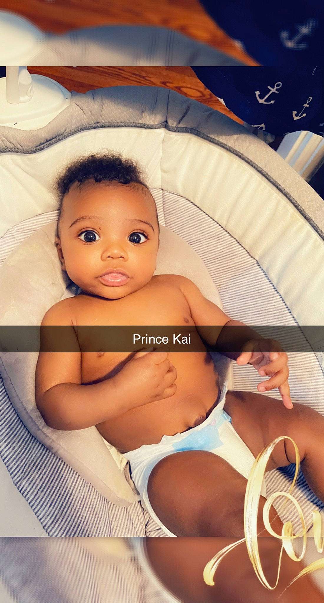 Jakai is registered to the contest to win money with this photo: baby, bathing, black_hair, cheek, chest, chin, comfort, eyebrow, eyelash, finger, flash_photography, happy, iris, mouth, neck, nose, person, product, skin, thigh