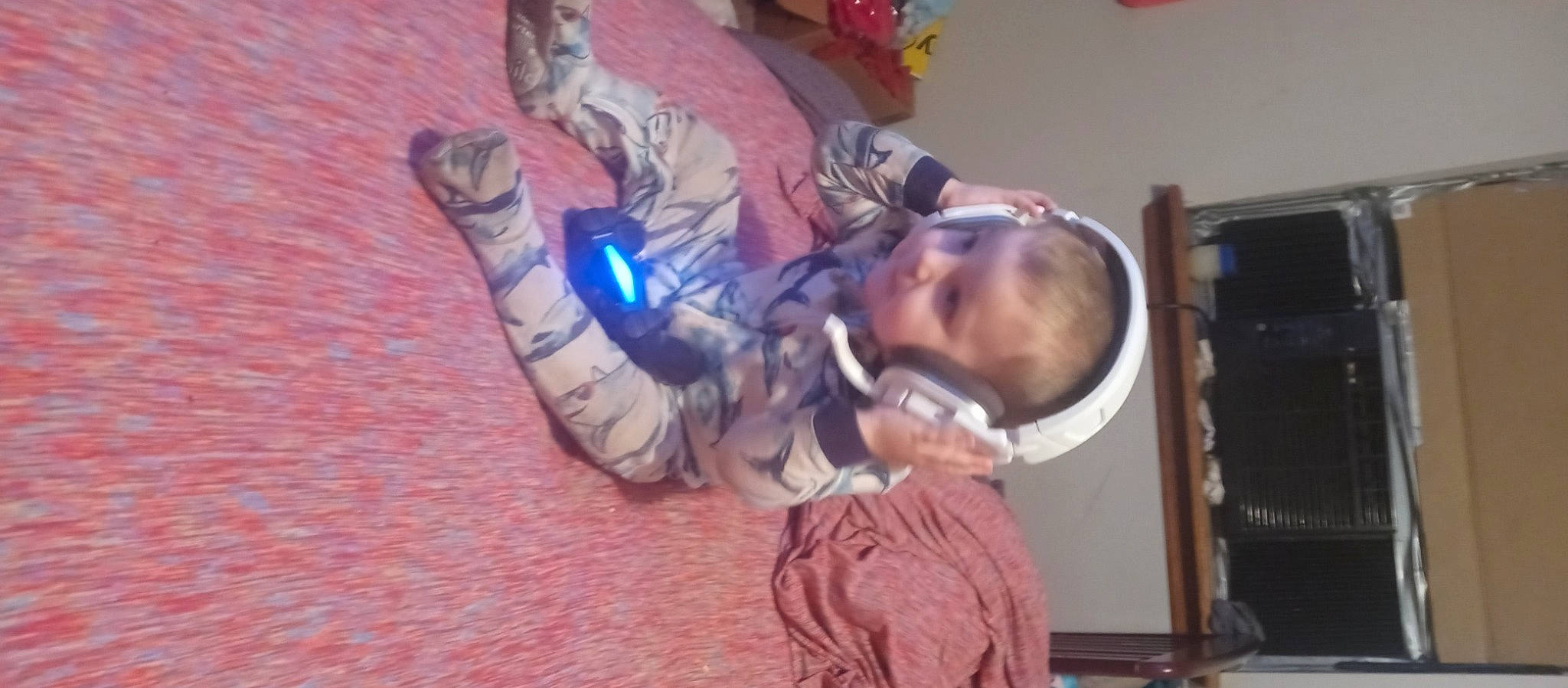 Alijah joined the competition — help win amazing prizes! costume, entertainment, event, fictional_character, flooring, fun, hat, helmet, microphone, person, personal_protective_equipment, toddler, walking_shoe