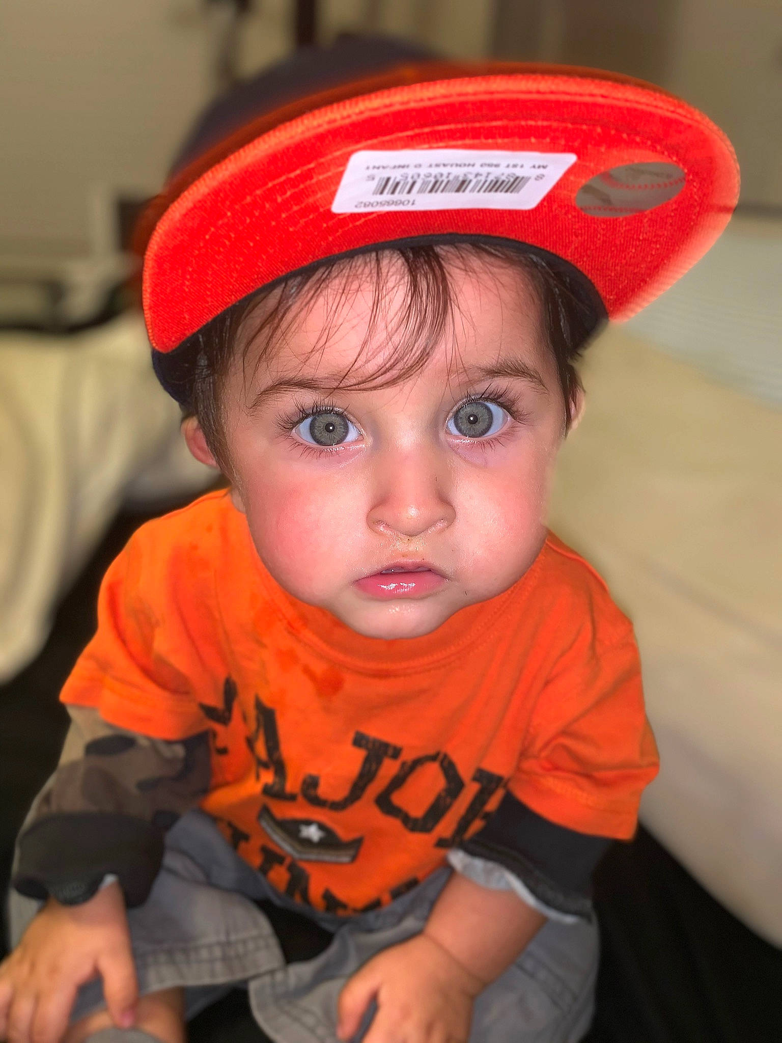 Dolph is registered to the contest to win money with this photo: child, clothing, fashion_accessory, fun, headgear, headwear, helmet, person, personal_protective_equipment, toddler